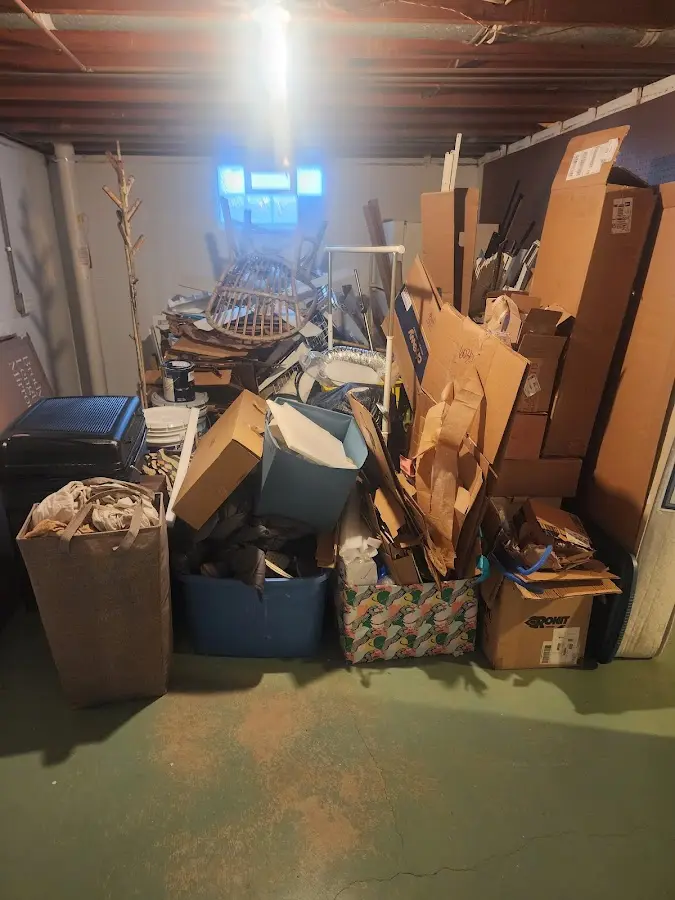 Roll-off dumpster container at job site for Concrete Dumpster Rental in Eau Claire